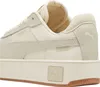 Close-up side view of a beige Puma sneaker. Produktbild-Vorschau
