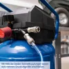 Close-up of an air compressor's control panel and hose connections. Produktbild-Vorschau