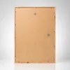 The back of a wooden picture frame is shown against a gradient background. Produktbild-Vorschau