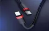 Close-up shot of two USB-C cables with red accents on a dark background. Podgląd zdjęcia produktu