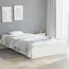 A white bed frame with white bedding is shown in a room with gray walls and light wood flooring. Produktbild-Vorschau