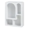 A white shelving unit with multiple open compartments of varying shapes and sizes. Anteprima dell’immagine prodotto
