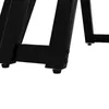 A close-up view of the black metal legs of a table. Produktbild-Vorschau