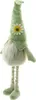 A decorative gnome figure with a green hat adorned with a sunflower, sitting with its legs extended. Voir les images du produit