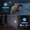 The image shows two scenarios: a child sleeping in bed with a night light, and someone walking down stairs with a motion-activated light. Text overlays describe the features of the night light. Podgląd zdjęcia produktu