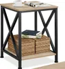 A close-up shot of a wooden and black side table with items on it. Náhled obrázku produktu