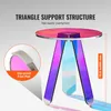 Close-up of a modern side table with iridescent legs and a circular top. Anteprima dell’immagine prodotto