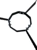 A black metal stand for a fire plate, shown against a white background. Produktbild-Vorschau