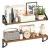 Two shelves are shown, each displaying various decorative items and books. Produktbild-Vorschau