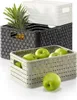 Three woven storage baskets are stacked and arranged. The front basket contains green apples, the middle basket contains a pineapple, and the top basket is empty and white. Voir les images du produit
