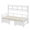 A white wooden daybed with beige cushions and a shelf unit at the head. Náhled obrázku produktu