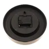The back of a round wall clock is shown, revealing the quartz movement mechanism and a hanging hook. Voir les images du produit