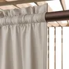 A close-up view of a beige outdoor curtain hanging from a brown rod, attached to a wooden structure. Produktbild-Vorschau