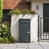 SoBuy Paketbox OGS66-DG geschlossen vor weißer Wand mit Blumen am Dach Productafbeelding-voorbeeld