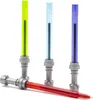 Four lightsaber-themed pens are arranged on a white background. One red pen is in the foreground, angled diagonally. Three other pens, in yellow, light blue, and purple, stand upright in the background. Náhľad obrázku produktu