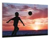 Wallario Wandbild Fußball - Kleiner Junge spielt im Produktbild-Vorschau 2
