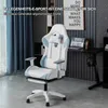 A gaming chair is shown in a room with a desk and a laptop. Anteprima dell’immagine prodotto