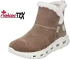 A single beige boot with white fur trim and a white sole, shown against a white background. The RiekerTEX logo is visible in the top left corner. Produktbild-Vorschau
