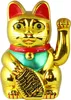 A golden Maneki-neko (lucky cat) figurine. Produktbild-Vorschau