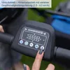 A close-up of a person's hand interacting with the control panel of a lawnmower or similar garden equipment. Produktbild-Vorschau