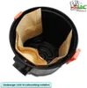 Top-down view of a vacuum cleaner bin with paper bags inside. Produktbild-Vorschau