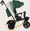 A close-up view of a green and black children's tricycle, highlighting its features. Produktbild-Vorschau