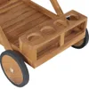 Close-up view of a wooden tea trolley with cup holders and wheels. Produktbild-Vorschau
