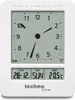 A white digital alarm clock with a clock face and date/temperature display. Anteprima dell’immagine prodotto