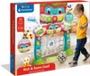 A child playing with a baby Clementoni Kick & Score Goal toy, shown on its packaging. Produktbild-Vorschau