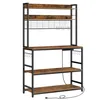 A freestanding kitchen baker's rack with shelves and hooks. Náhled obrázku produktu