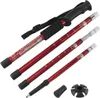 A set of red adjustable walking poles with black handles and accessories. Produktbild-Vorschau
