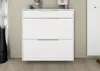 A white shoe cabinet with two drawers is shown against a light gray wall. Produktbild-Vorschau