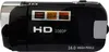 A black digital camera with silver accents is shown against a white background. Produktbild-Vorschau