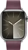 A close-up, front-facing view of a smartwatch with a dark face and a burgundy band. Náhľad obrázku produktu