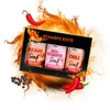 A gift box of three mustards with chili peppers and flames. Produktbild-Vorschau