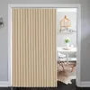 A beige pleated curtain hangs in a doorway, partially obscuring a dining area with a table and chairs. Produktbild-Vorschau