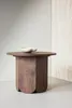 A wooden side table with a decorative bowl on top, set against a neutral background. Produktbild-Vorschau