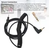 A coiled black headphone cable with gold connectors and an adapter. Anteprima dell’immagine prodotto