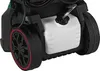 A close-up view of the bottom section of a pressure washer, showing its wheels, a white detergent tank, and some black casing. Produktbild-Vorschau