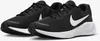 A pair of black Nike sneakers with white accents on a white background. Voir les images du produit