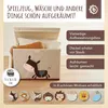 A storage box with a horse design, filled with pillows and blankets, displayed on a wooden floor. Voir les images du produit
