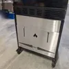 Close-up of the lower section of a stainless steel grill accessory. Produktbild-Vorschau