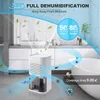 A white dehumidifier is shown in a bathroom setting, with graphics indicating its function and effectiveness. Produktbild-Vorschau