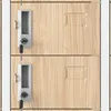 A close-up view of two stacked lockers with keys in the locks. Náhled obrázku produktu