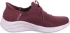 A side view of a red Skechers slip-on sneaker with a white sole. Voir les images du produit
