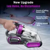 A hand holding a vacuum cleaner over a bed with a person sleeping in the background. Produktbild-Vorschau