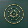 A close-up of a decorative panel with a floral motif. Produktbild-Vorschau