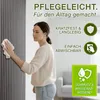 A woman is cleaning a wall panel with a cloth. The image includes marketing text and icons highlighting product features. Náhled obrázku produktu
