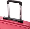Close-up of a luggage handle and part of the suitcase. Náhľad obrázku produktu