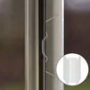A close-up view of metal clips used for greenhouse glass, with a circular inset showing a stack of the clips. Náhled obrázku produktu